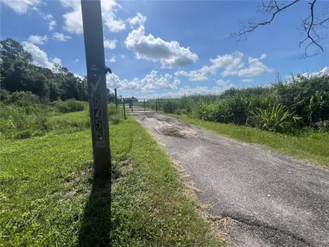 Fenced Agricultural Land with Home