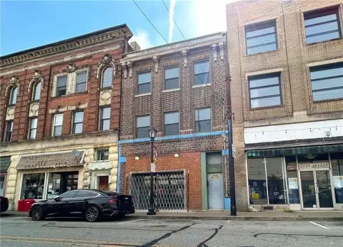 Mixed-Use Property with Three Residences