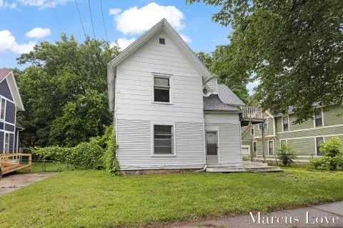Vacant Triplex With New Roof