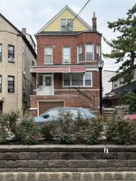 All-Brick Three-Family Home