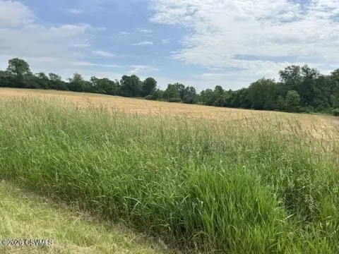Highway-Commercial Acreage with Tillable Land