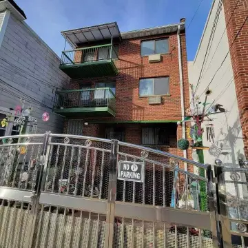 Three-Family Brick Home in Corona