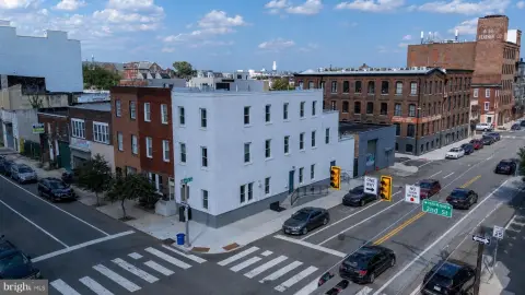 Corner Triplex with Balconies