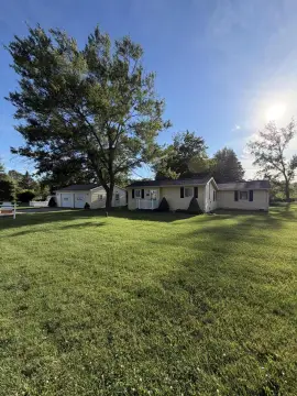 Riverfront Land with Single-Story Home