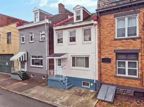 Brick Duplex with Private Outdoor Spaces