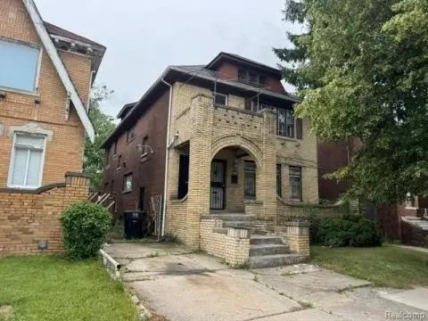 Brick Duplex with Side Driveway