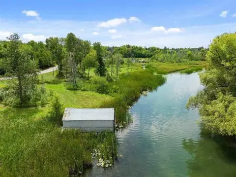 Alanson Crooked River Frontage Land
