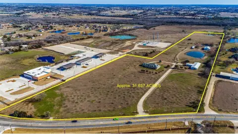 Commercial Land with Existing Improvements
