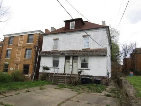 Legal Three-Unit Triplex with Dormer