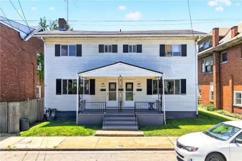 Triplex With Detached Garage