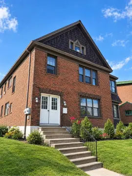 Brick Duplex With Detached Garage