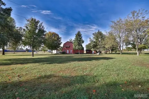 Commercial Land with Existing Buildings
