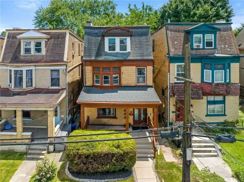 Brick Triplex with Three Units