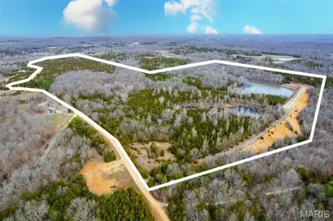 153 Acres with Private Lake