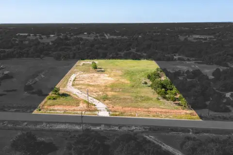 Fenced Residential Homesite with Driveway