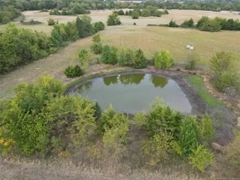 Expansive Land with Pond