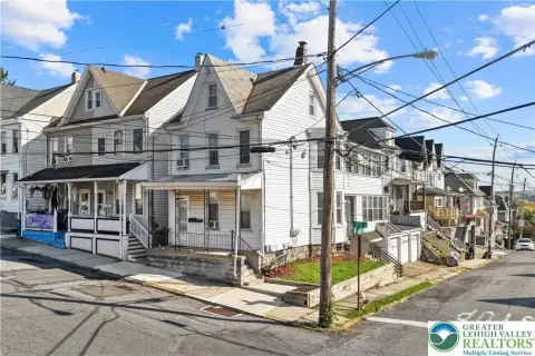 Two-Unit Duplex with Three Garages