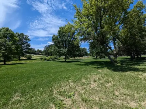 Sloping Waterfront-Access Land Lot