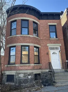 Brick Triplex with Updated Interiors