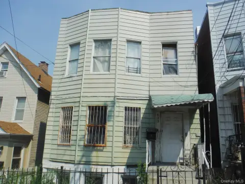 Two-Story Triplex Requiring Renovation