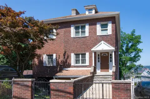 Brick Legal Three-Family with Patio