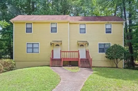 Three-Unit Triplex with Garages