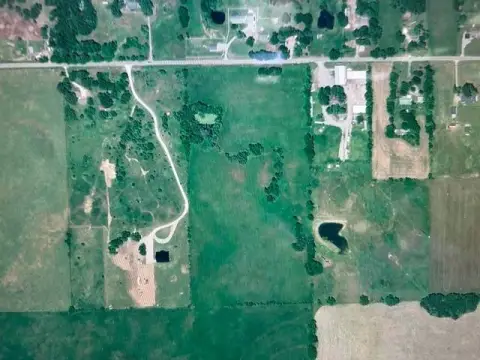 Fenced Agricultural Land with Barn