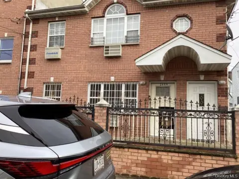 Brick Duplex with Driveway