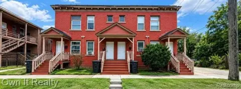 Brick Quadplex With Separate Entrances