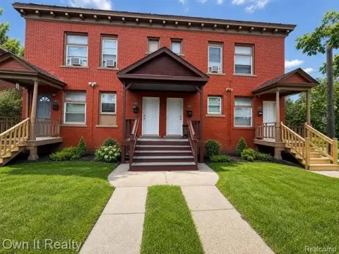 Brick Quadplex With Separate Entrances
