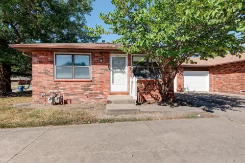 Brick Duplex with New Garage Doors
