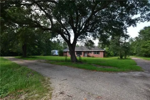 Zoned Land with Existing Structures