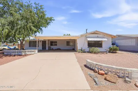 Duplex with Two Separate Carports