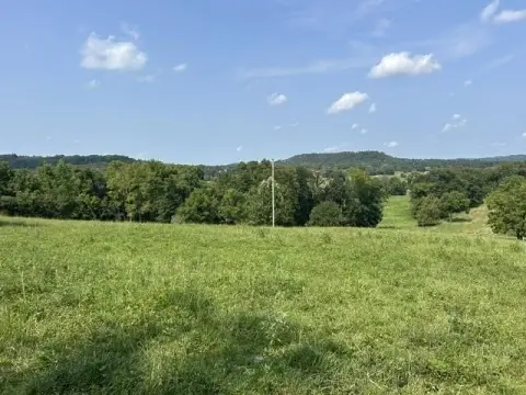 Fenced Pasture Farmland with Pond