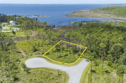 Gated Waterfront Homesite in Community