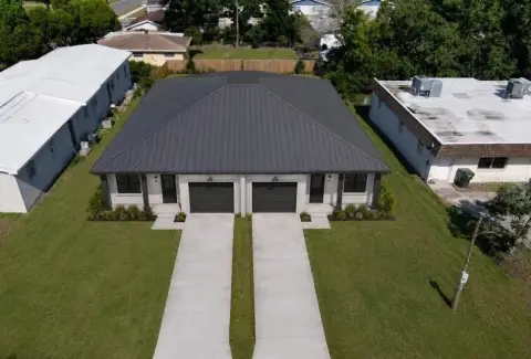Duplex With Garages And Porches