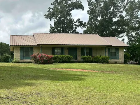 Unrestricted Land with Creek and Home