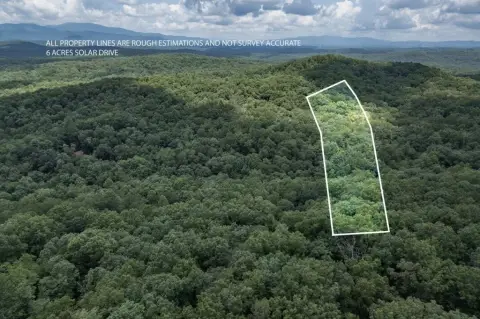 Wooded Land with Creek Across Front