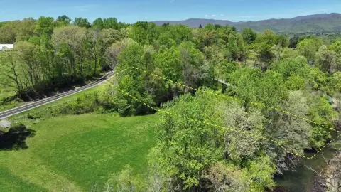 Riverfront Land with Level Building Site