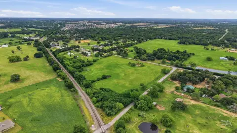 Acreage with Road Frontage and Pond