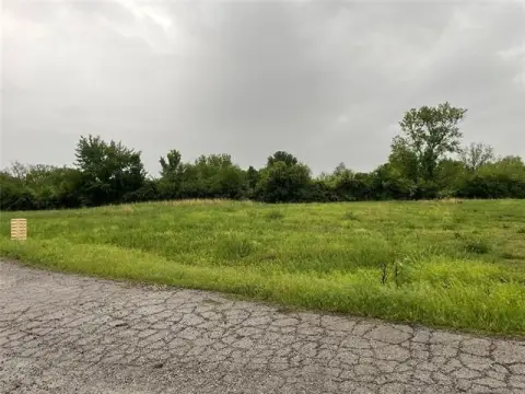 Buildable Acre Lot in Addition