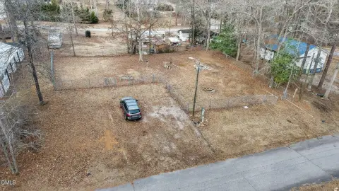 Cleared, Fenced Lake Community Lot