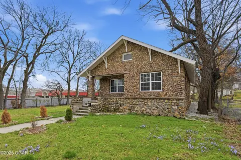 Remodeled Rock House with Shop