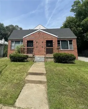 Tenant-Occupied Two-Family Ranch