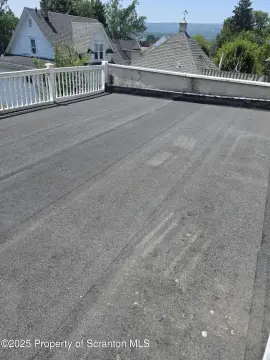 Renovated Triplex with Three-Car Garage