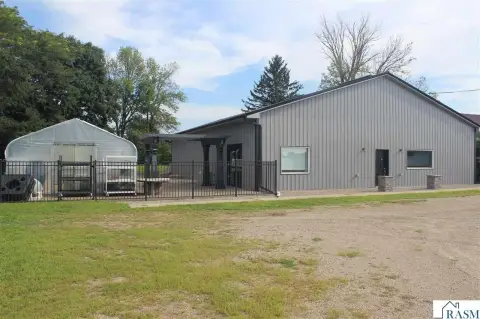 Commercial Land with Improved Building