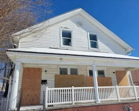 Frame Triplex Property with Basement