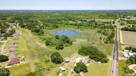 Wooded Land with Pond and Frontage