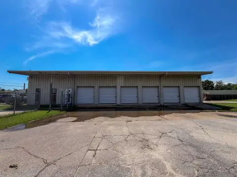 Fenced Warehouse with Eight Bay Doors