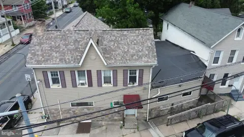 Mixed-Use Bar and Apartment Property